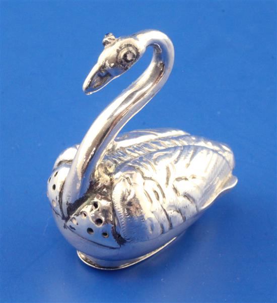 A late 19th/early 20th century Dutch novelty silver pepperette/pounce pot, modelled as a swan, height 1.75in.